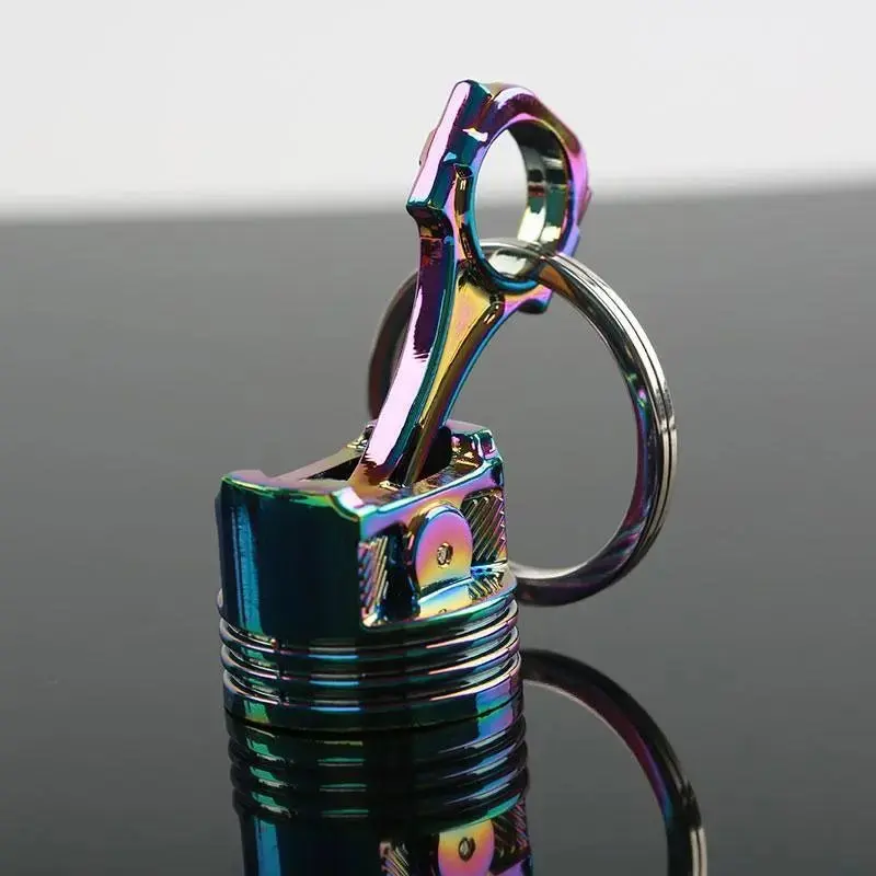 Porte-clé piston en métal
